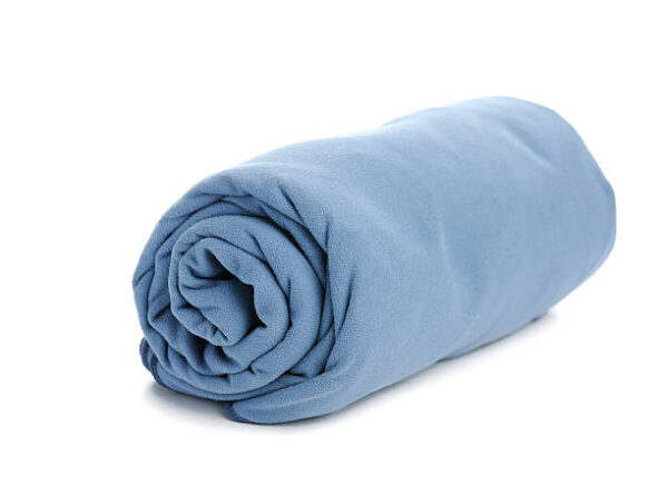 Blue microfiber towel isolated on white background